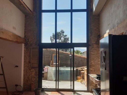 Réalisation d’une ouverture dans un mur de façade pour accueillir une très grande fenêtre à Passa
